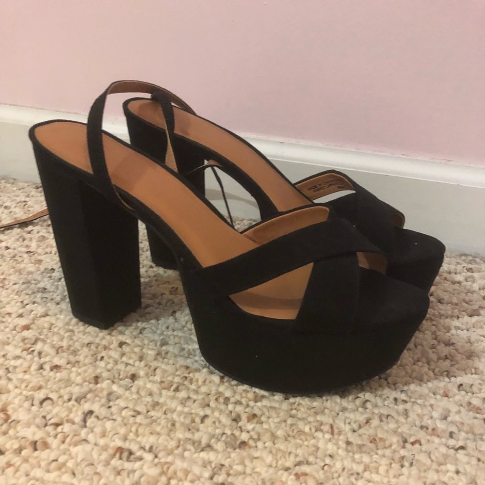 Black strapped platforms